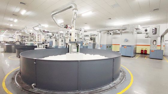 Fabbricazione a partire da filati di fibre sintetiche